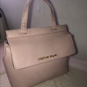 Christian Siriano pink crossbody handbag.